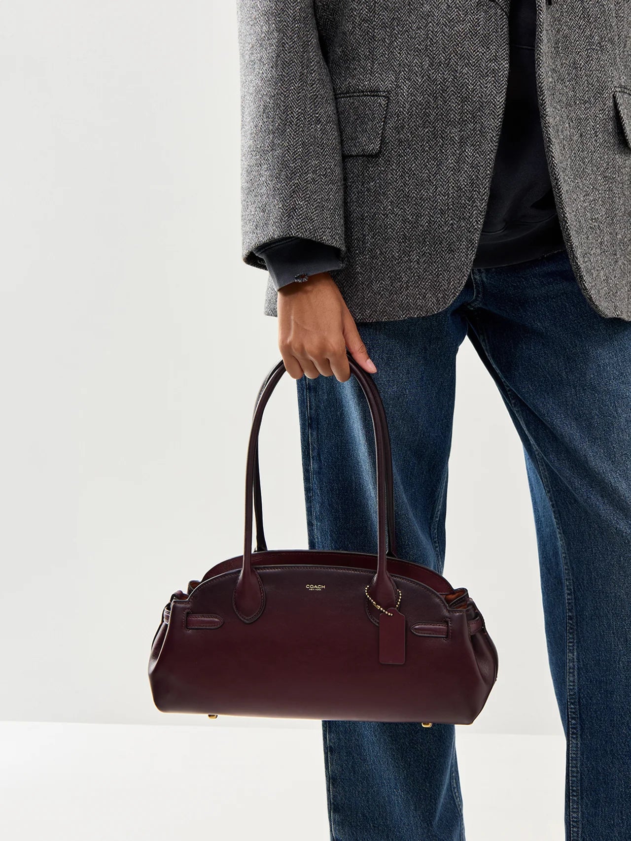 COACH  
Empire Carry All 34 Bag burgandy